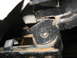 1995 Ford C-350 (Centurion Conversions) - A detailed view of a vehicle's suspension system, focusing on a specific component and surrounding frame elements.