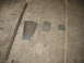 1995 Ford C-350 (Centurion Conversions) - Metal fabrication parts laid out on a concrete surface.