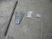 1995 Ford C-350 (Centurion Conversions) - Various metal components laid out on a concrete surface.