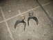 1995 Ford C-350 (Centurion Conversions) - These are leaf spring shackles, likely for a truck or heavy-duty vehicle.