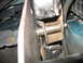 1995 Ford C-350 (Centurion Conversions) - A detailed view of a vehicle's suspension system, focusing on a specific mechanical part.