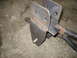 1995 Ford C-350 (Centurion Conversions) - Close-up of custom fabricated metal suspension components, possibly for a truck.