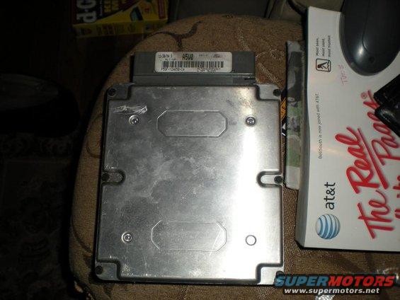 Ford engine control unit with part number F5TF-12A650-CA visible