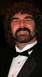 1990 Ford Bronco - A man in formal wear smiles for the camera.