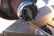 1990 Ford Bronco - A Warn locking hub is shown attached to a vehicle's wheel hub, with a box of lug nuts nearby.