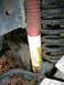 1987 Ford Bronco - Driver side aux shock rubs spring.