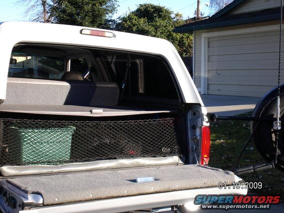cargo-cover-pics-003.jpg The covers are nice for keeping gear out of the sun or hidden from prying eyes. The net is stock too but pretty much useless other than holding small items. Of course if you roll, everything in there will hit you in the head.....