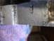 1996 Ford Mustang - Close-up of a metal part showing stamped alphanumeric characters.