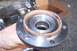1990 Ford Bronco - Close-up view of a wheel hub assembly, showing the splined interior and bolt mounting points.