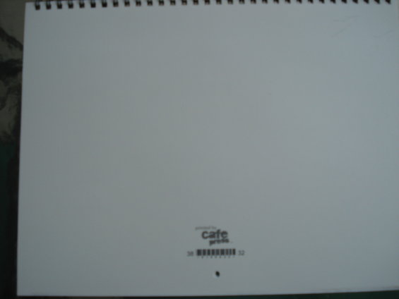 White document with spiral binding and "cafe press" logo and barcode