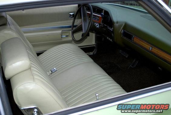 1972 Buick LeSabre interior with light-colored pleated seats and wood-grain trim