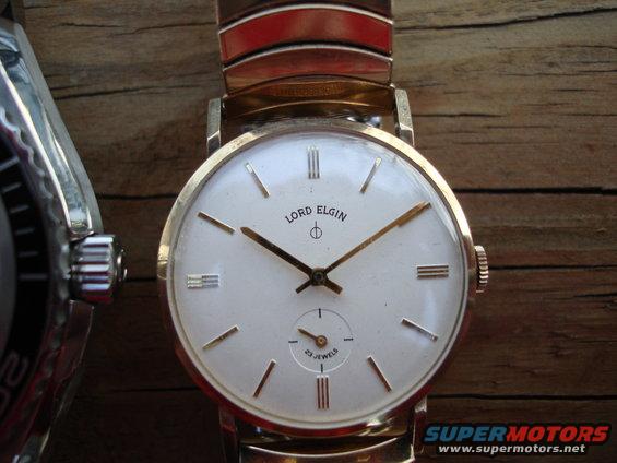 Gold Lord Elgin watch with white face and 23 jewels subdial