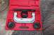 1990 Ford Bronco - A ball joint press tool kit is shown in its red plastic case, ready for use on vehicle suspension components.