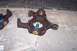 1990 Ford Bronco - Ball joint assemblies, likely for a truck or SUV, are shown resting on concrete.