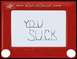 1990 WetJet Duo - An Etch A Sketch displays the message "YOU SUCK" on its screen.