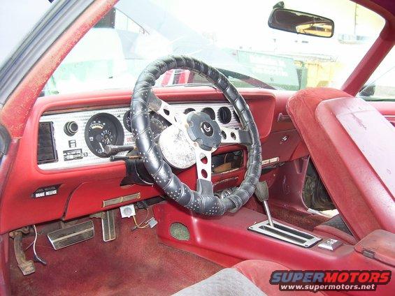 1978 Pontiac Trans Am interior with red seats and dashboard
