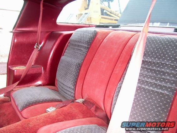 1978 Pontiac Trans Am interior rear seat with red upholstery and patterned gray inserts