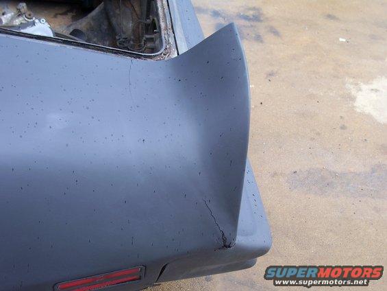 1978 Pontiac Trans Am rear quarter panel and spoiler with visible cracks