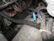 1989 Ford Bronco - Close-up of engine wiring harness showing a blue connector with exposed wire.