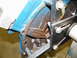 1968 Mercury Cougar - Close-up of an engine block with attached metal bracket and hardware.