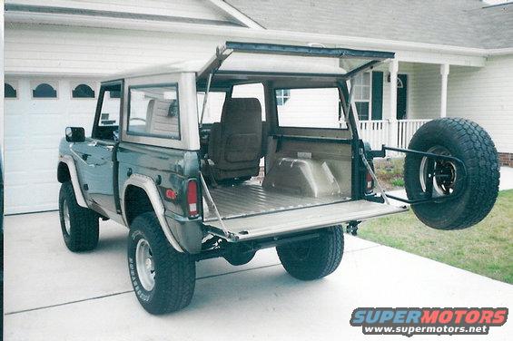 o8.jpg The colors are 2000 Eddie Bauer Expedition Estate Green & Light Prarie Tan.  Bedwall panels and rear seat are waiting.

Eventually, all the Rhino inside had to be covered because it was too noisy.