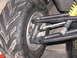 2006 Ford F1 - Close-up view of a go-kart's tire and suspension system, including the shock absorber.