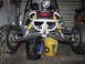 2006 Ford F1 - Go-kart front end supported by buckets in a garage.
