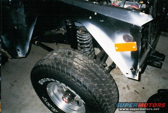 k1.jpg New inner fender with undercoating.  Nice tires, huh?