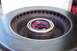 1990 Ford Bronco - Wheel bearing assembly packed with red grease, ready for installation.