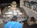 1970 Ford Mustang - Engine assembly with degree wheel and parts on shelf. The claim of a 1970 Ford Mustang does not match.