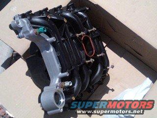 The new Intake Notice that the coolant crossover is aluminum instead of plastic. I decided to tackle this job myself because all I had to cover was the manifold ($280) from autozone. A shop would have charged @ least $1200!!!