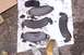1990 Ford Bronco - New brake pads are ready for installation, suggesting maintenance or repair work.