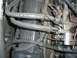 2000 Mercury Grand Marquis - Close-up view of engine fuel lines and associated components, showing potential signs of wear and leaks.