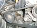 2000 Mercury Grand Marquis - Engine belt tensioner and pulleys showing a fluid leak.