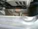 2000 Mercury Grand Marquis - A close-up view of an engine component, showing wiring and metal parts.