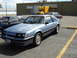 1986 Ford Mustang - This 1986 Ford Mustang coupe is parked in a lot with other vehicles visible.