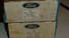 1979 Ford Bronco - Boxes of Ford tow hooks are stacked, showing part numbers and branding.