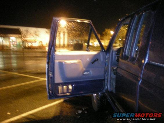 1991 Ford Bronco interior door panel and open door at night