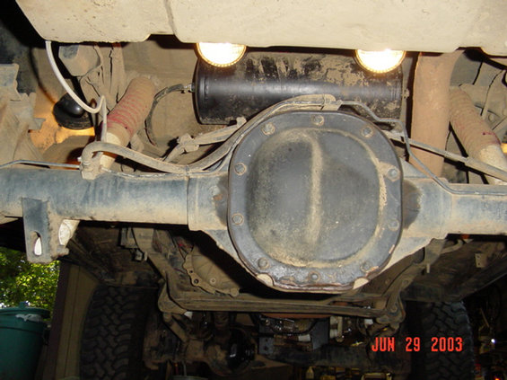 more-rock-lights-001.jpg I moved the sealed beams from the front bumper to above the rear axle pointing back