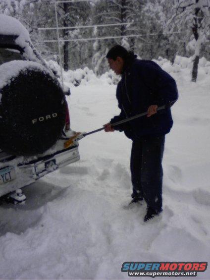 p_00080.jpg my son gettin some snow off the bko
