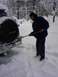 my son gettin some snow off the bko