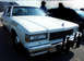 1998 Ford Crown Victoria - This 1980s sheriff car features a prominent push bumper and 'SHERIFF' lettering on the front fender.