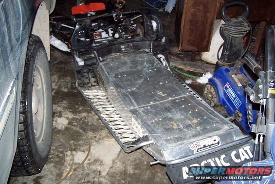 Snowmobile with Arctic Cat branding