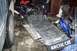 2004 Arctic Cat F-7 Firecat - A snowmobile with Arctic Cat branding is parked next to a car tire and other equipment.