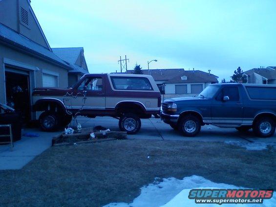 0208091016.jpg parked in front of my 96. both trucks are sitting there with 31x10.50x15's so you can see just how high 6 inches of suspension lift are. before the lift both trucks were identical in height. 