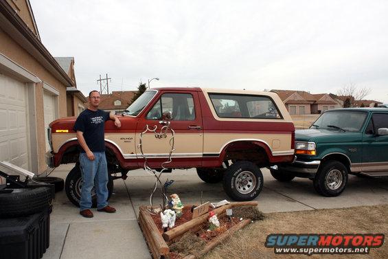 img_2227.jpg me posing with the truck. I am 6'1 so lets just say its a good thing to have a mini step stool to get at the engine. on a side note you can stand on a tire to get in there in a pinch.