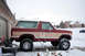 1986 Ford Bronco - tires mounted up on 15x10 wheels. I think it raised the truck another 2 or 3 inches over the 31's