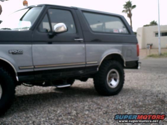 1994 Ford Bronco side view, two-tone paint