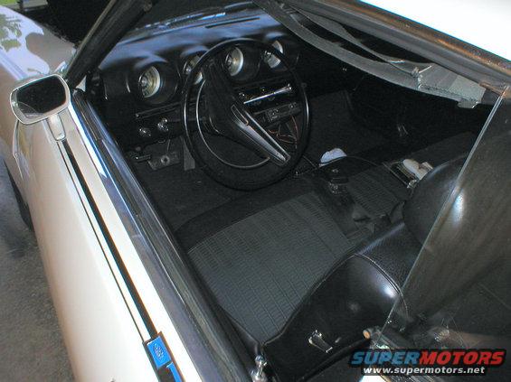 talladega-white-interior.jpg The second part of the set: a restored white Talladega that he also drives.  With a blue one, he'd finish the set.