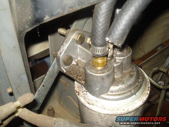 close-up of fuel filter assembly with hoses attached